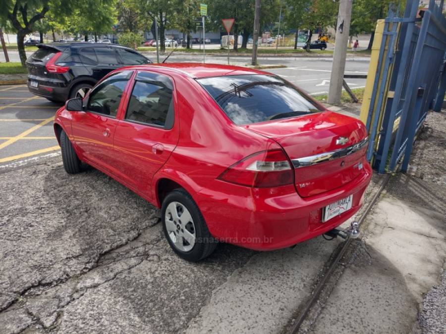 CHEVROLET - PRISMA - 2012/2012 - Vermelha - R$ 34.000,00