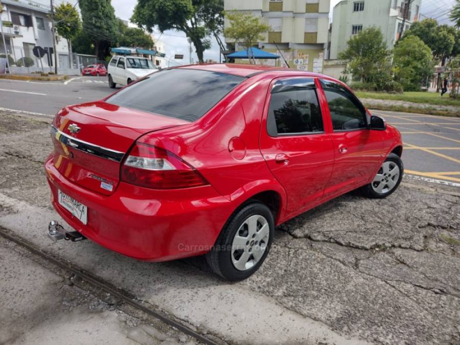CHEVROLET - PRISMA - 2012/2012 - Vermelha - R$ 34.000,00