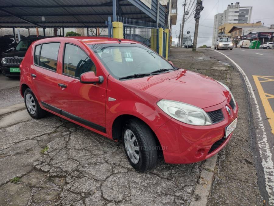 RENAULT - SANDERO - 2010/2011 - Vermelha - R$ 29.800,00