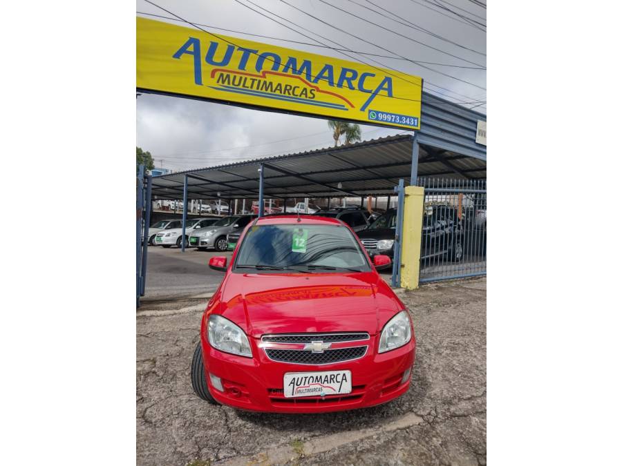 CHEVROLET - PRISMA - 2012/2012 - Vermelha - R$ 34.000,00